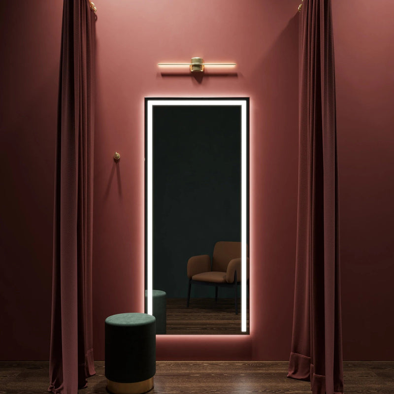 ACARI Decor rectangular LED mirror framing a dressing room in a home-living setting. Claris Company.