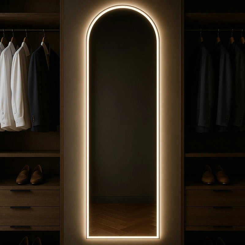 Marlowe soft-arch LED mirror with backlight in a home-living interior. Claris Company.