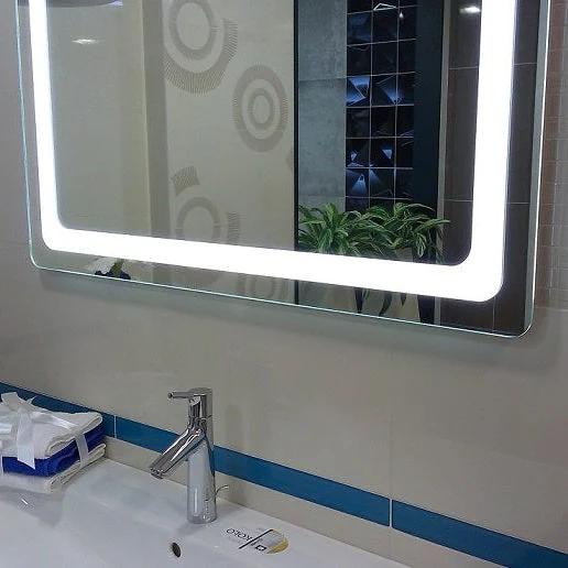 BARDI LED bathroom mirror with rounded corners and slim profile. Claris Company.