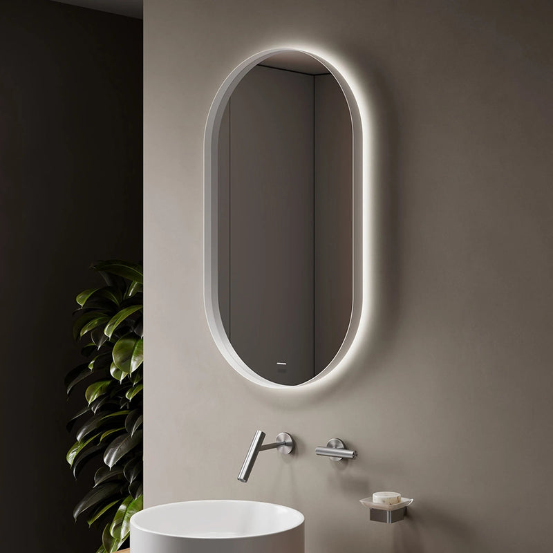 DIANO WHITE bathroom mirror, close-up of the reflective surface and frame. Claris Company.