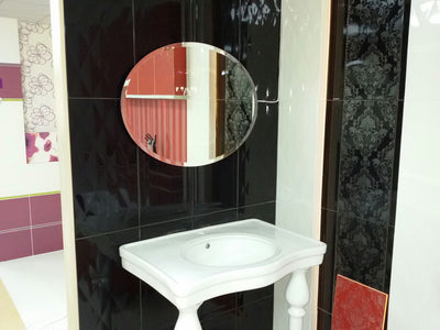 ASOLA round mirror on wall