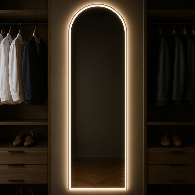 Marlowe soft-arch LED mirror with backlight in a home-living interior. Claris Company.