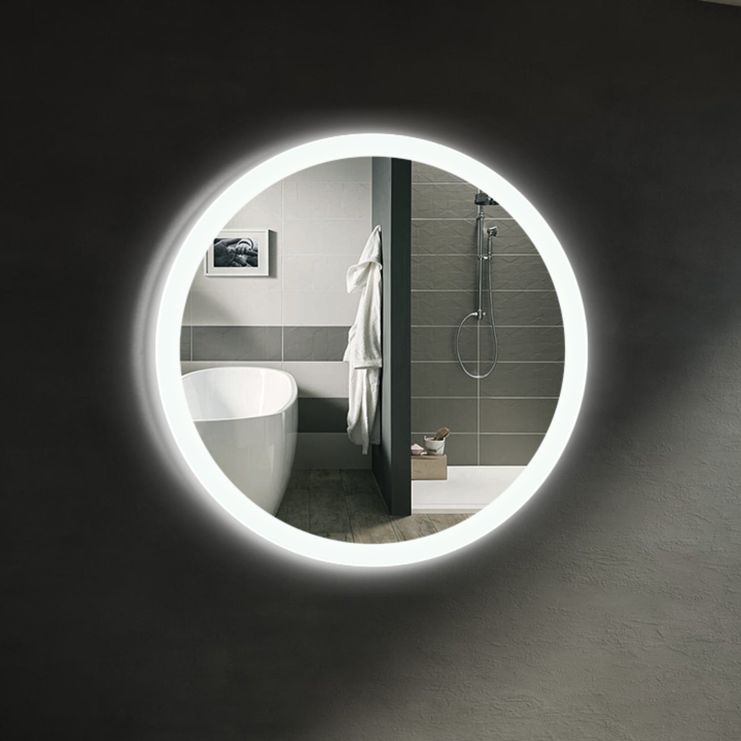 Sensa round LED bathroom mirror with a subtle ring of light. Claris Company.