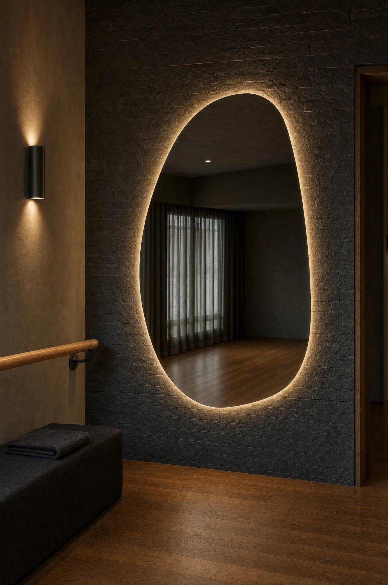 Claris STONE STUDIO large-format asymmetric backlit mirror in a dance and movement studio, Studio Line
