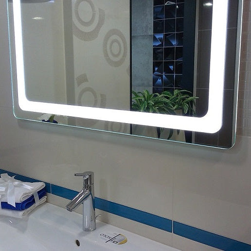 BARDI LED bathroom mirror with rounded corners and slim profile. Claris Company.