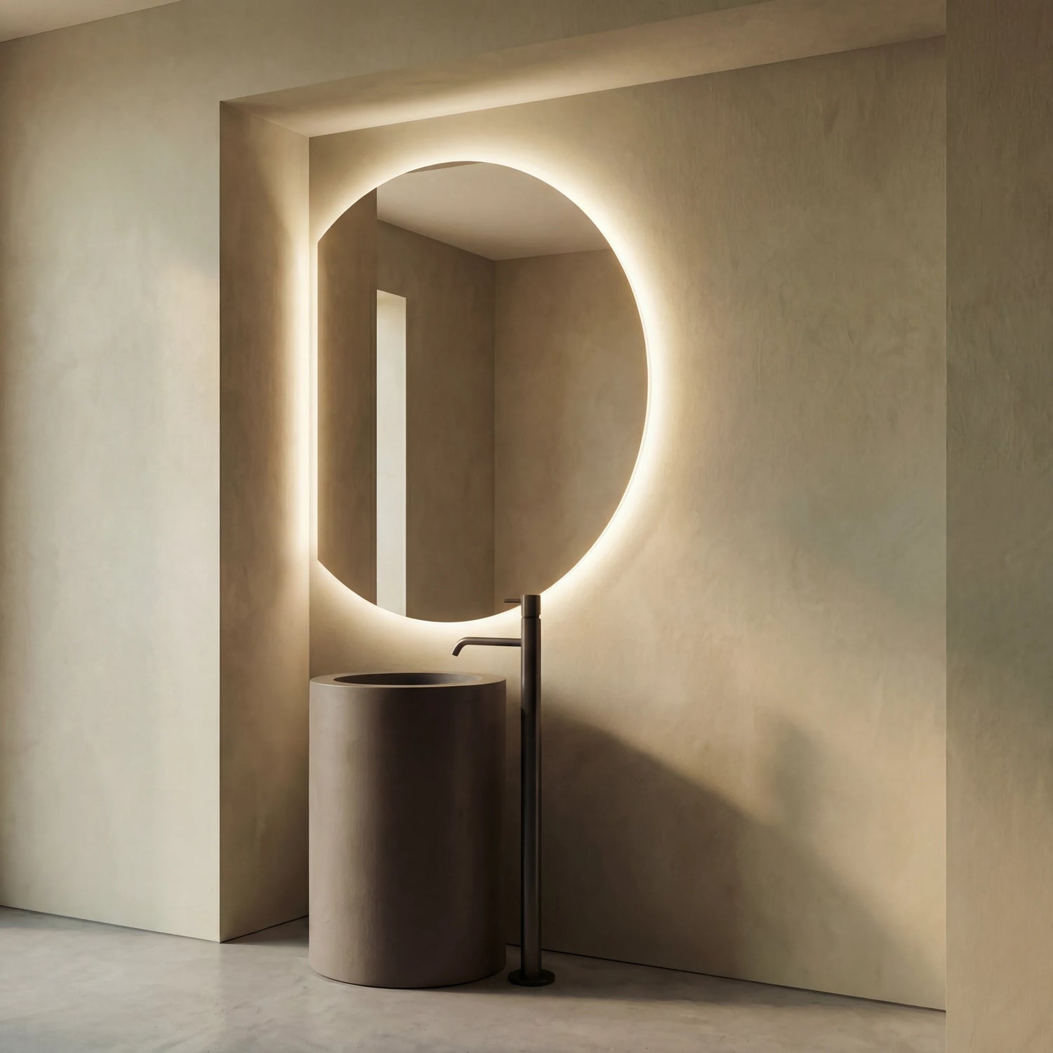Claris COMO offset round backlit LED bathroom mirror in moon-phase silhouette, Terra Collection