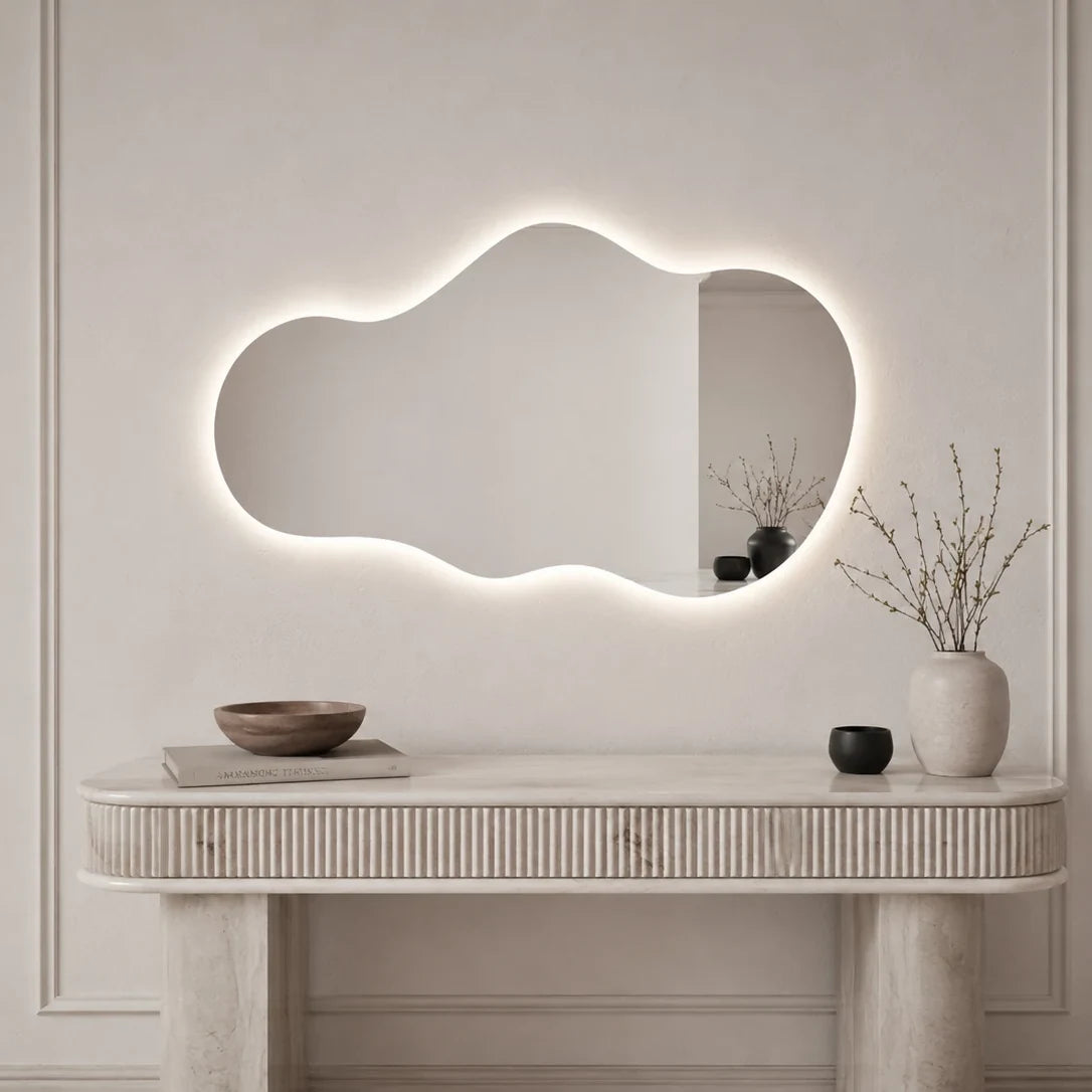 Claris EMIRA free-flowing organic backlit LED mirror in a home-living interior, Terra Collection