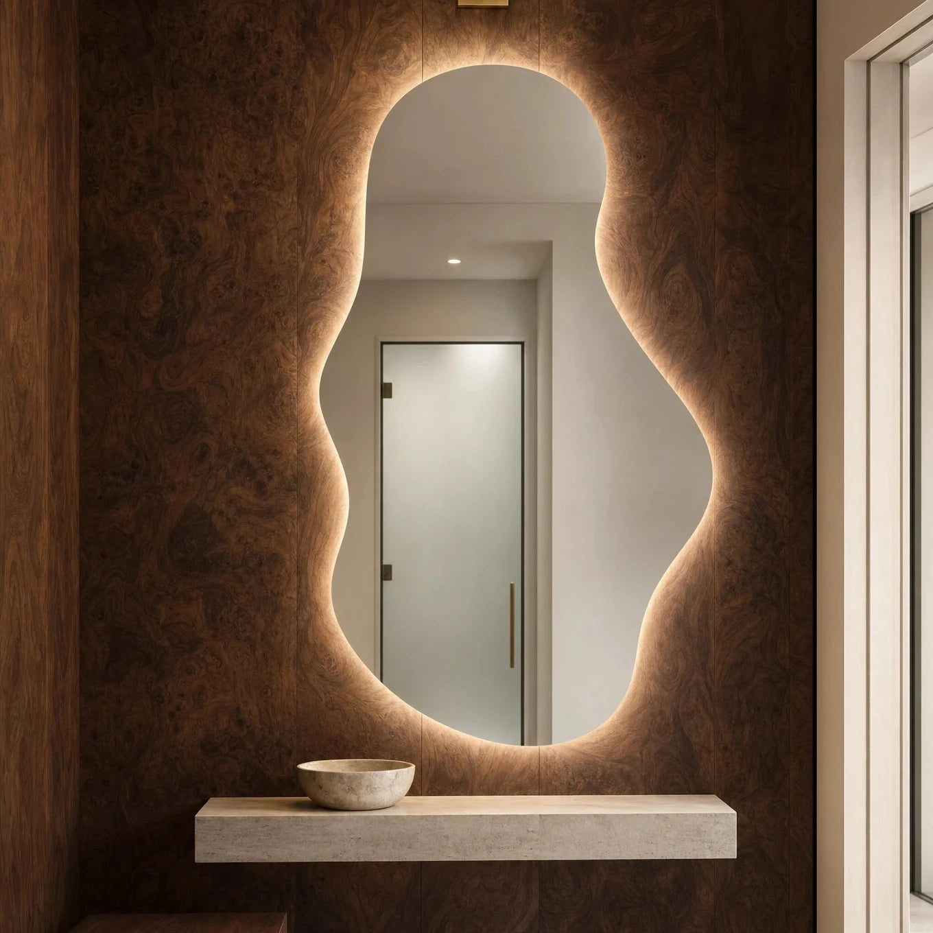 Claris EMIRA STUDIO organic backlit mirror in an aesthetic clinic entry, Studio Line
