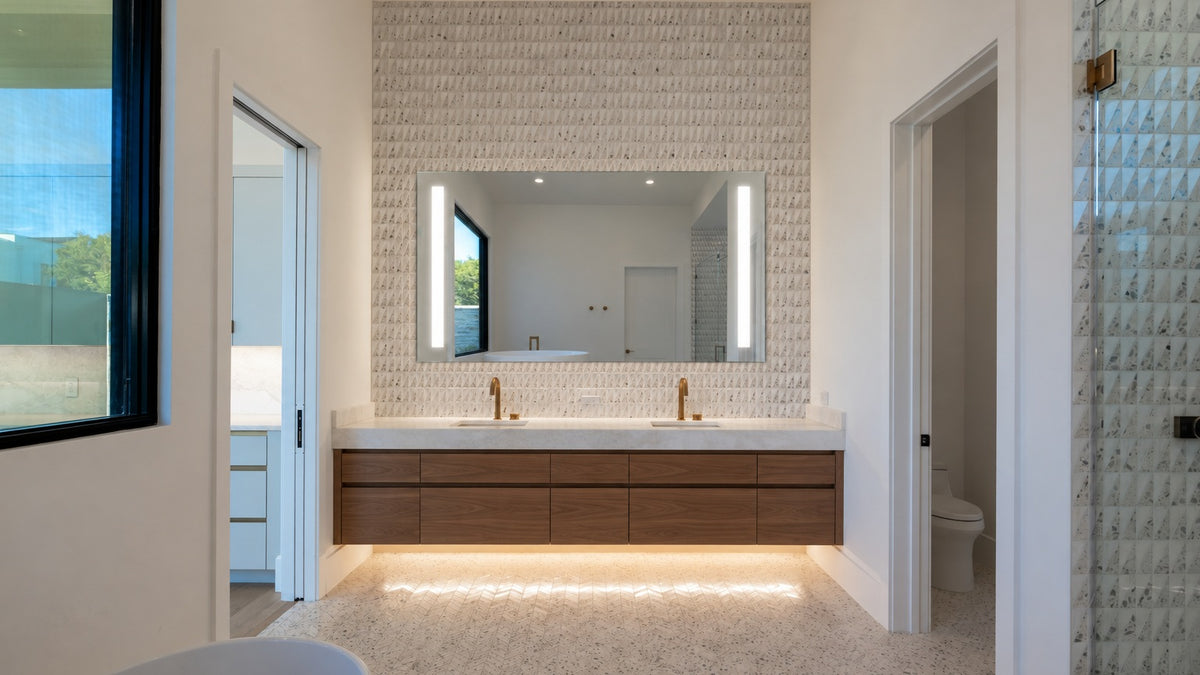 Claris LUGO LED mirror above a walnut double vanity, terrazzo floor