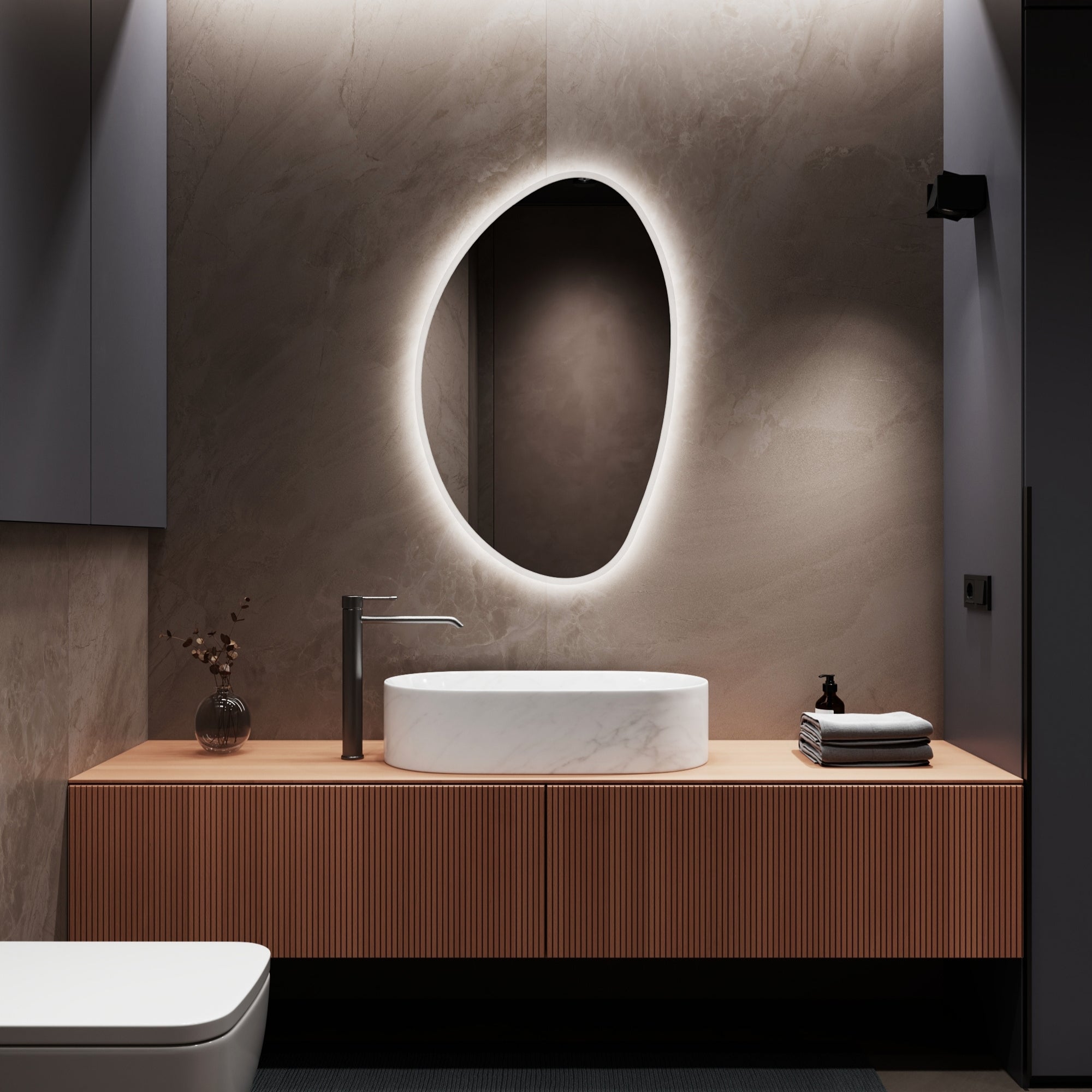 Sleek PEBBLE mirror blending contemporary design with natural inspiration