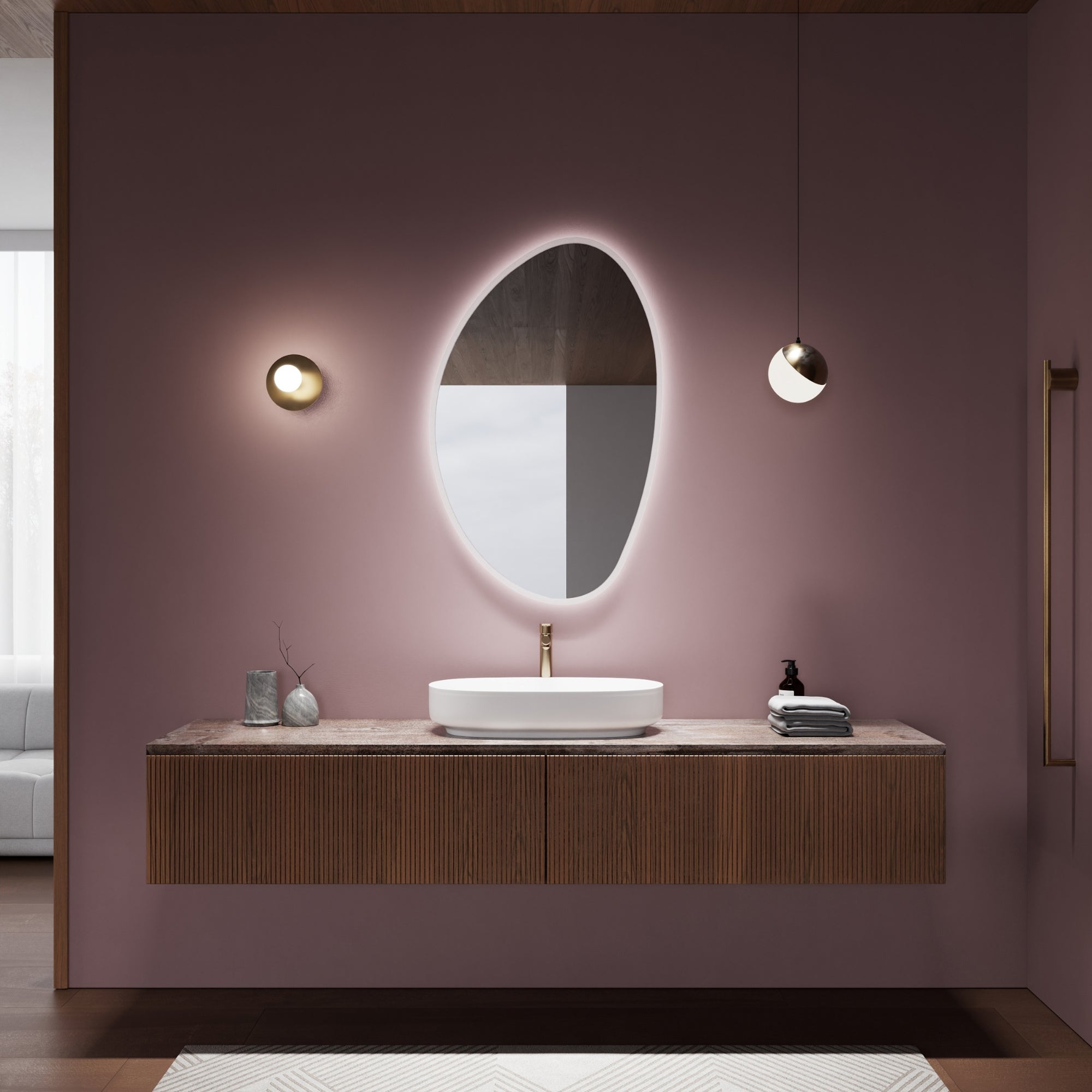 Wall-mounted PEBBLE mirror adding artistic elegance to any space