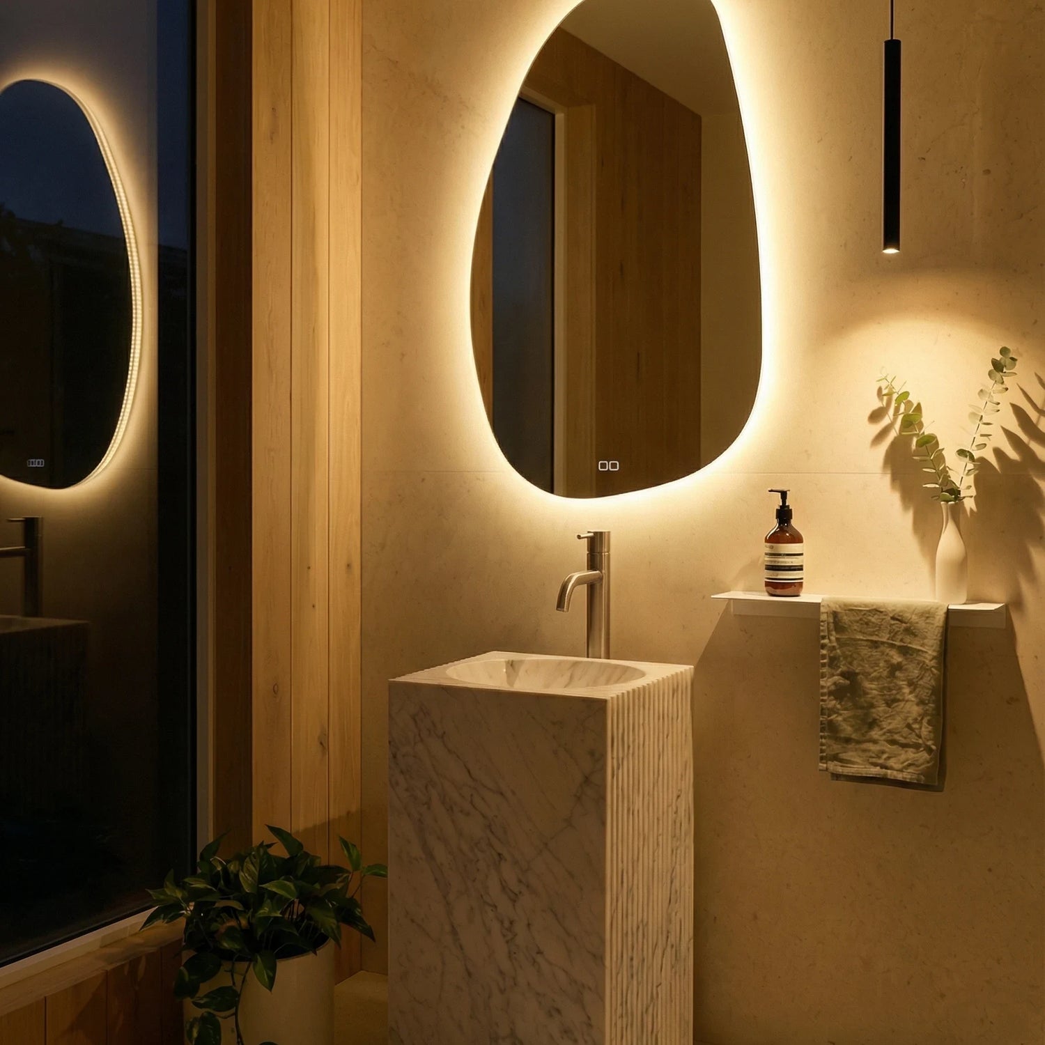 Claris STONE asymmetric backlit LED bathroom mirror with raw rock silhouette, Terra Collection