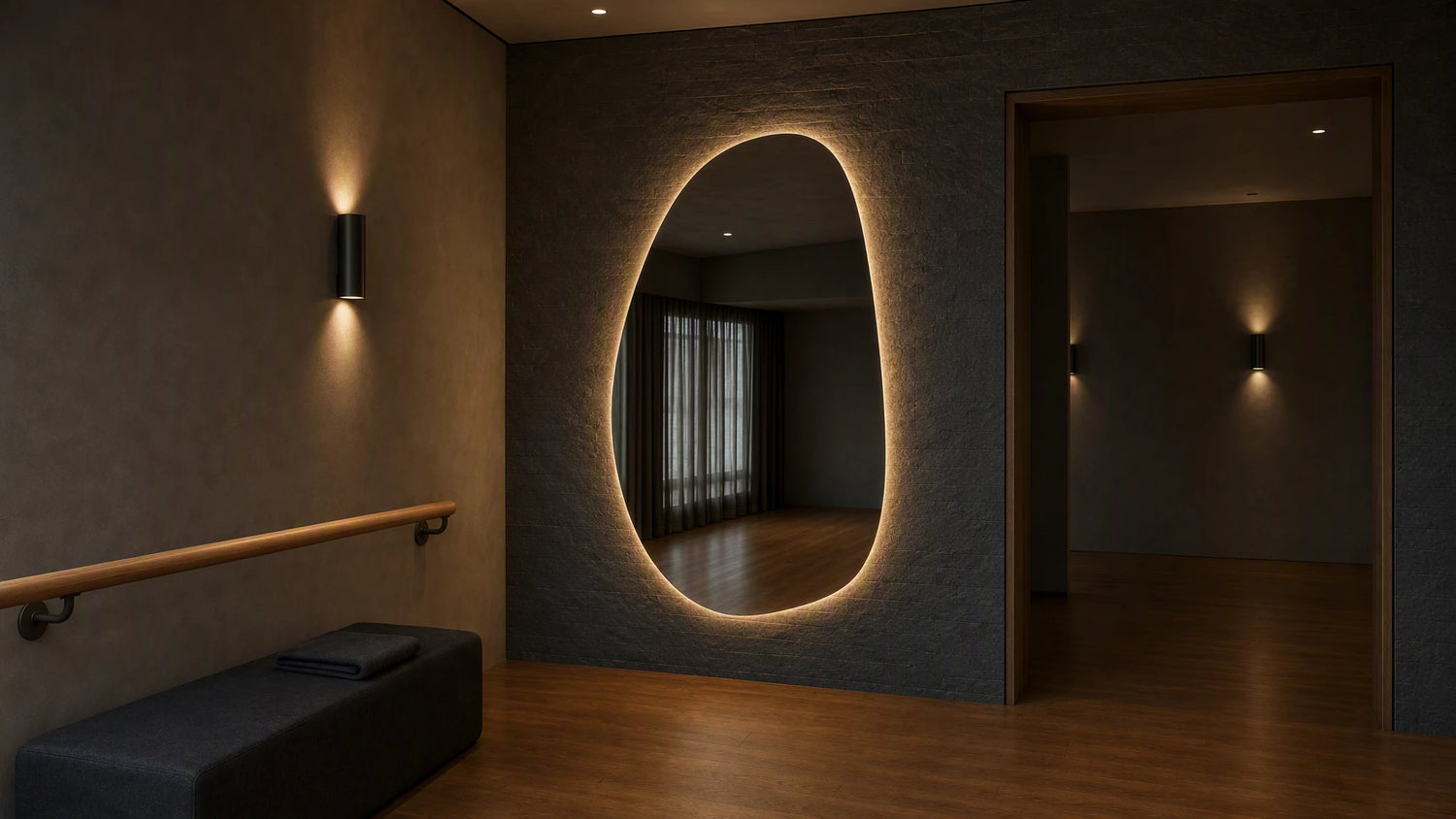 Claris STONE STUDIO backlit mirror in a studio interior, wide view, Studio Line