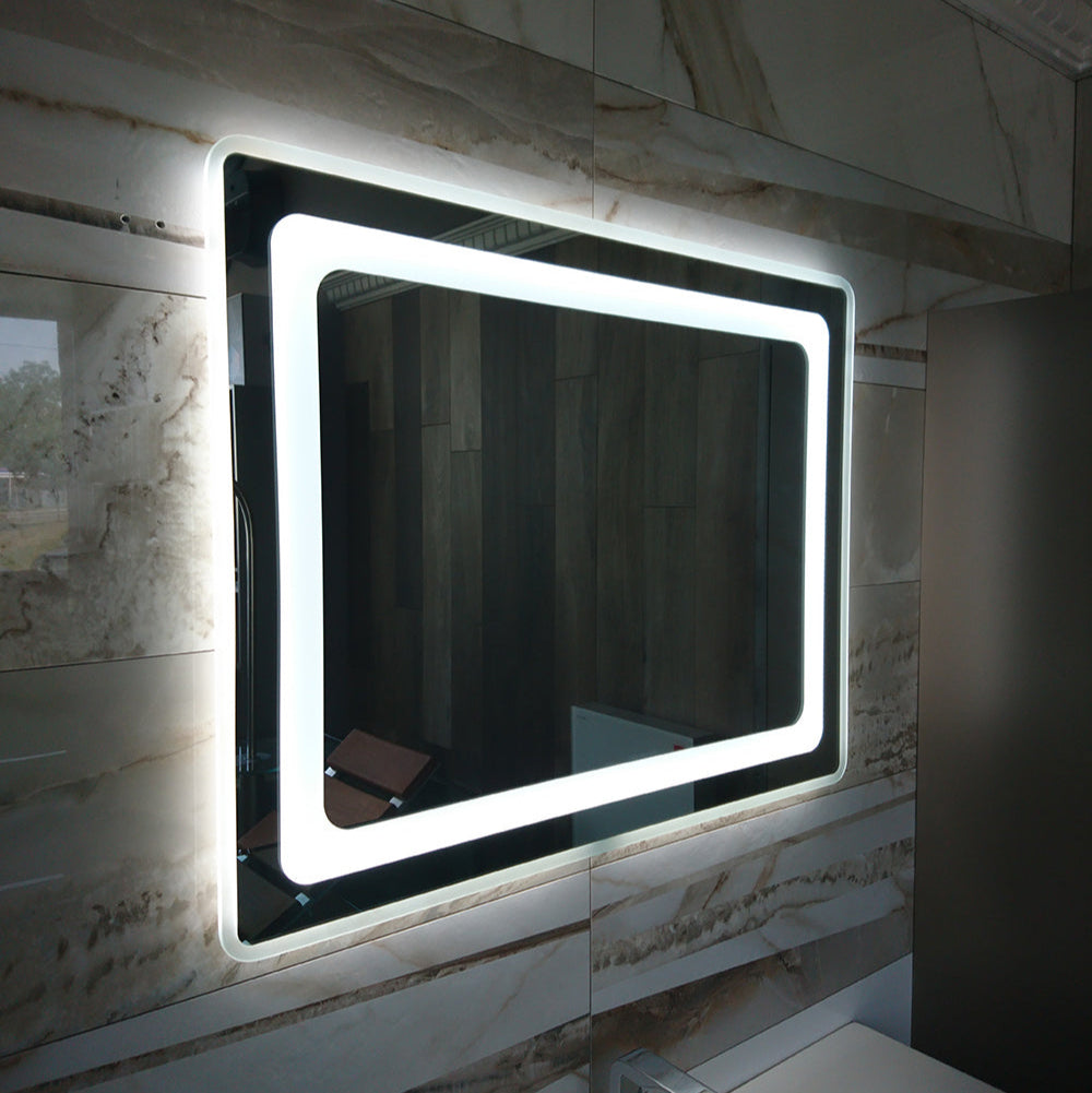 Valentino LED bathroom mirror with glowing frame and rounded corners. Claris Company.